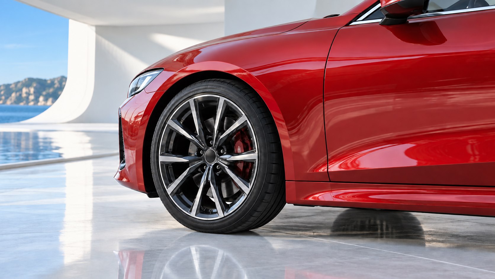 Modern red car alloy wheel and body detail